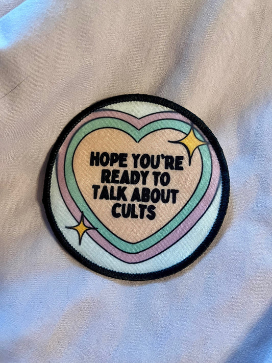 “Hope You’re Ready to Talk About Cults” Iron-On Patch – Bold Statement Embroidered Appliqué